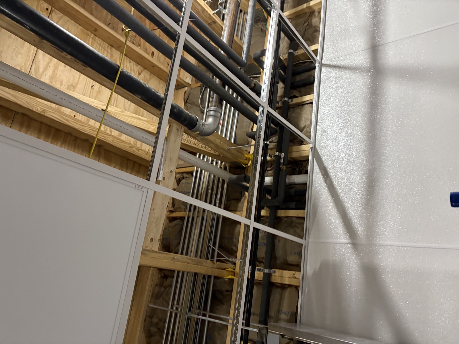 Commercial metal stud framing and plumbing
